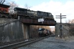 NS 9334 passes over a coal train led by NS 4079